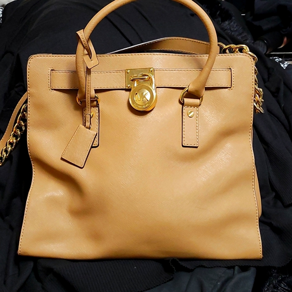 Tan colored Michael Kors bag